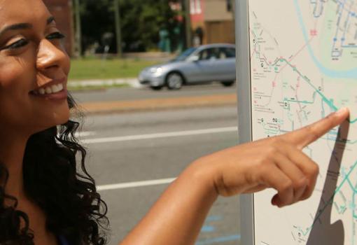 woman reading a CHK designed system map